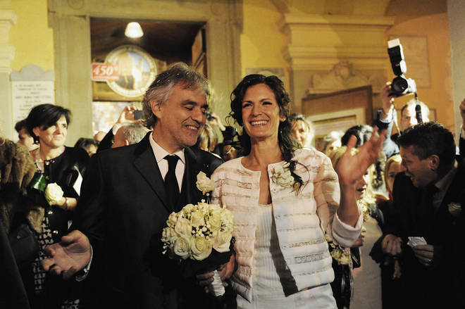 Andrea Bocelli and Veronica Berti leave the Sanctuary of Madonna di Montenero after their wedding on March 21, 2014 i