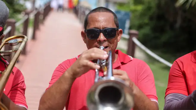 Brass musicians perform live in the streets in Varadero, Cuba
