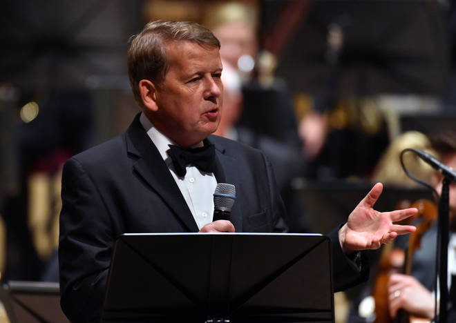 Bill Turnbull presents on stage with the Royal Liverpool Philharmonic Orchestra during Classic FM's 25th Birthday concert