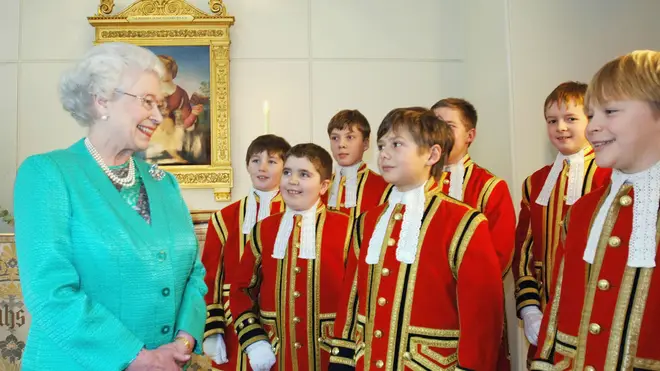 Queen Elizabeth II with choristers from Her Majesty's Chapel Royal