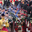 The Massed Pipes and Drums of Scottish and Irish Regiments outside Westminster Abbey during the State Funeral of HM Queen Elizabeth II.