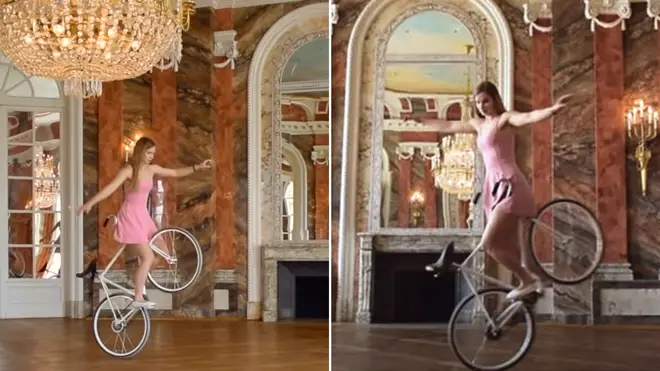 Viola Brand dances on a bicycle