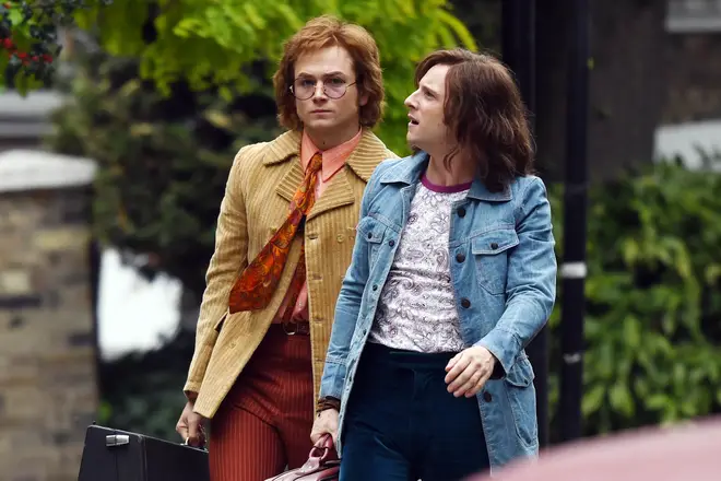 Taron Egerton and Jamie Bell on the set of Rocketman