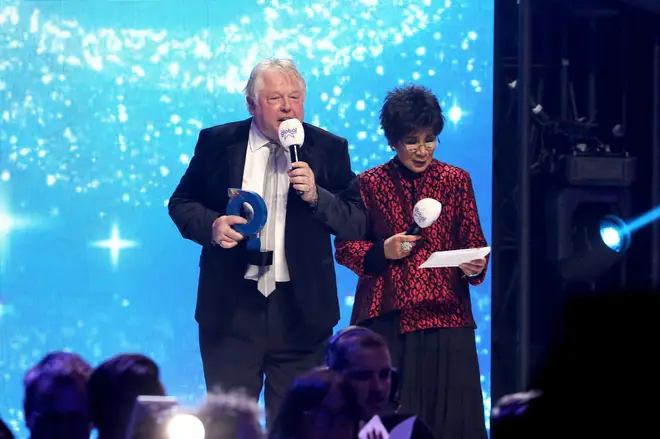 Nick Ferrari and Moira Stuart on stage at The Global Awards 2019 with Very.co.uk