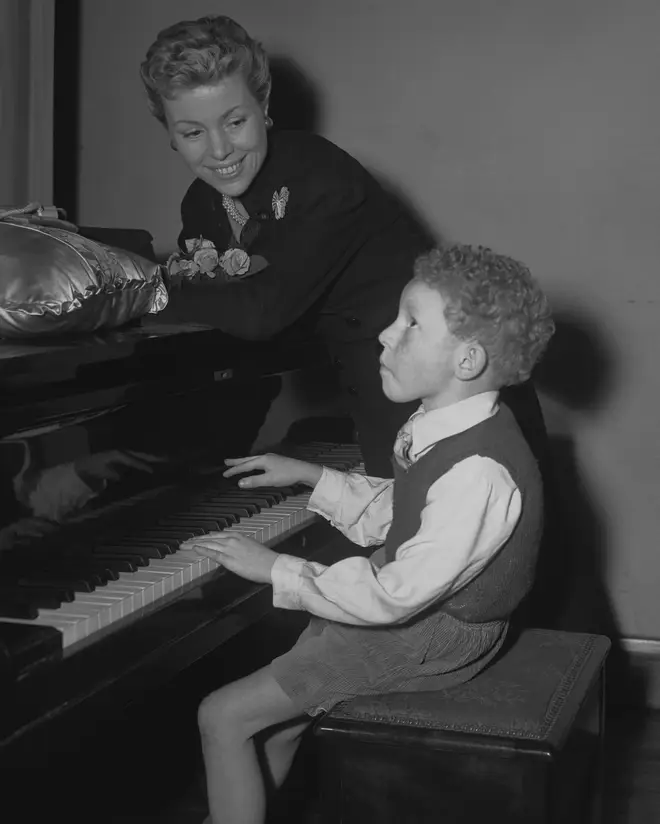 Roy Budd plays the piano as a 7-year-old boy