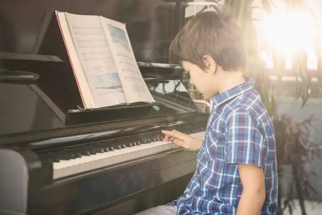 Boy playing piano