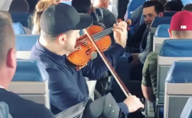 Giora Schmidt plays Bach on a Delta Airlines flight