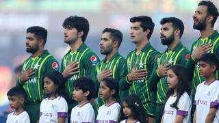 Members of the Pakistan cricket team sing their national anthem.