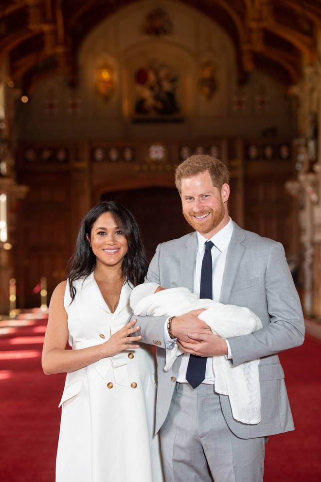 Prince Harry and Meghan Markle make their first appearance with their baby boy