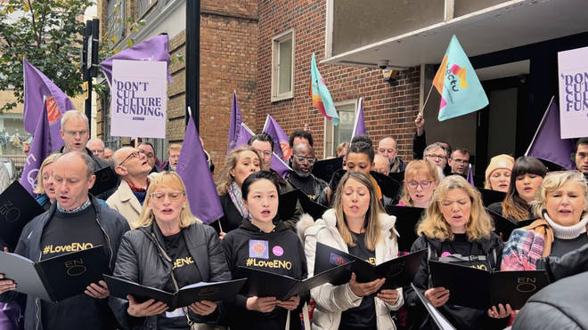 ENO chorus sing ‘You’ll never walk alone’ from Carousel outside the ACE London office