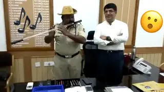 This police officer turned his baton into a flute
