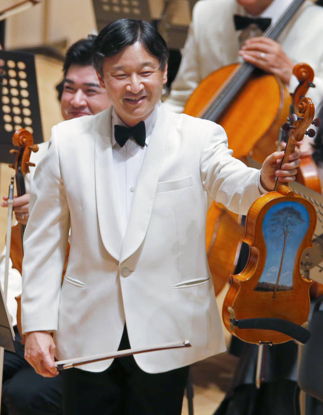 Emperor Naruhito played on a violin made from driftwood debris from the 2011 tsunami