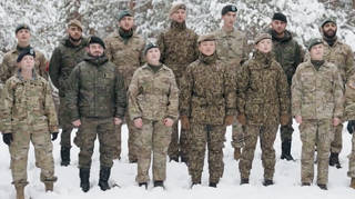 Choir of NATO soldiers sing ‘Carol of the Bells’