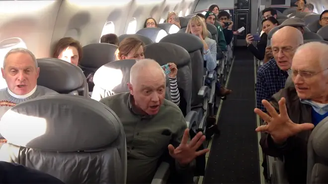 Barbershop quartet of elderly men sing in harmony to entertain passengers on delayed flight