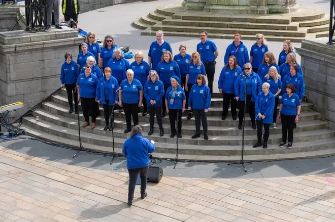Hull NHS Choir performing at a music festival.
