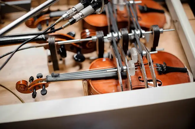The violins are played using pedals