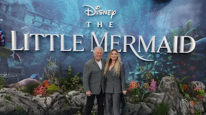 Alan Menken appears at the London premiere of The Little Mermaid with his daughter, Anna Rose Menken, in Leicester Square.