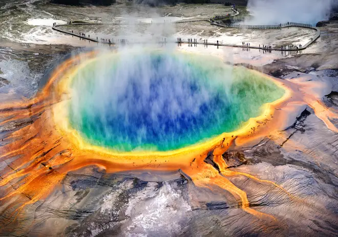 Yellowstone National Park is home to over half of the world’s geysers, including the Grand Prismatic Spring (pictured).