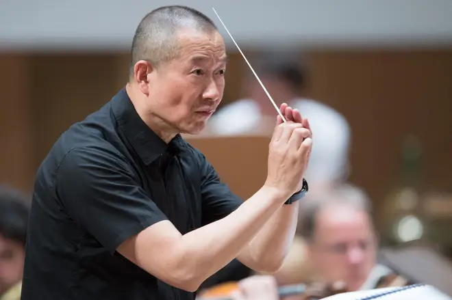 Chinese composer Tan Dun directs the Munich Philharmonic Orchestra in 2018