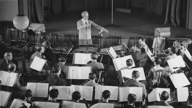 Wilhelm Furtwängler conducting the Berlin Philharmonic during a rehearsal in 1947