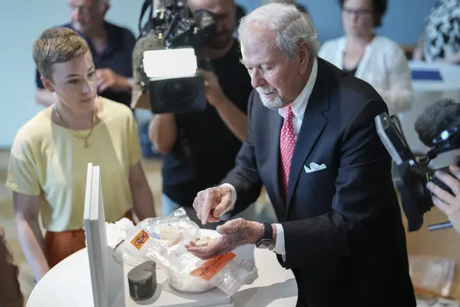 US businessman Paul Kaufmann shows the fragments to journalists at the Medical University of Vienna, Austria