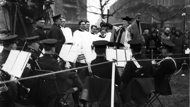 Dame Ethel Mary Smyth DBE conducts at the unveiling of a statue of Emily Pankhurst