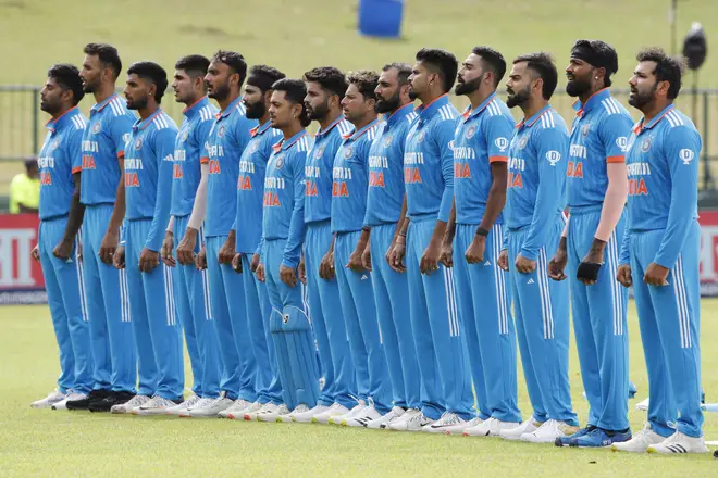 India players stand to sing the national anthem at Pallekele International Cricket Stadium in Sri Lanka