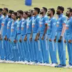 India players stand to sing the national anthem at Pallekele International Cricket Stadium in Sri Lanka