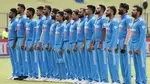 India players stand to sing the national anthem at Pallekele International Cricket Stadium in Sri Lanka