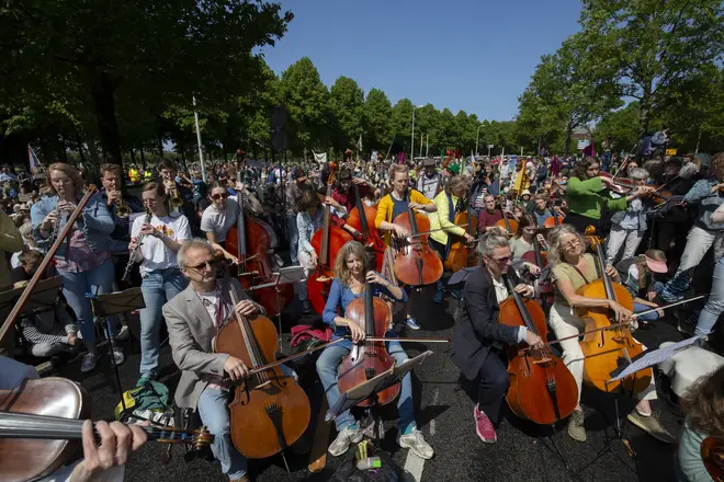 Musicians play Beethoven in fossil fuel subsidy protest in May 2023.