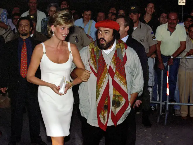 Luciano Pavarotti greets Lady Diana on her arrival to the Pavarotti & Friends concert in Modena, Italy in 1995