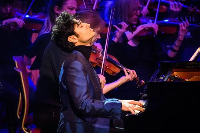 Arsha Kaviani at the piano with the Royal Liverpool Philharmonic Orchestra