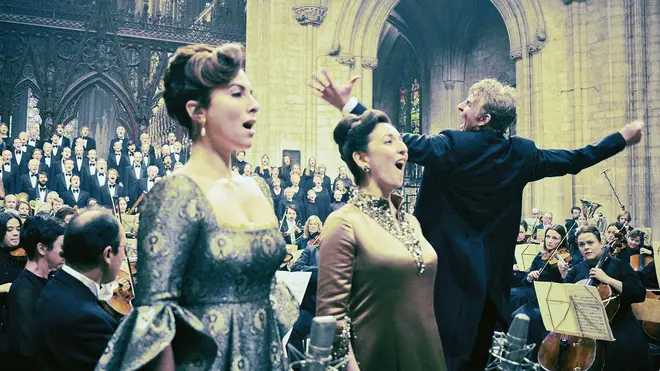 Bradley Cooper as Leonard Bernstein, conducting the London Symphony Orchestra in Mahler’s Resurrection Symphony in Ely Cathedral.