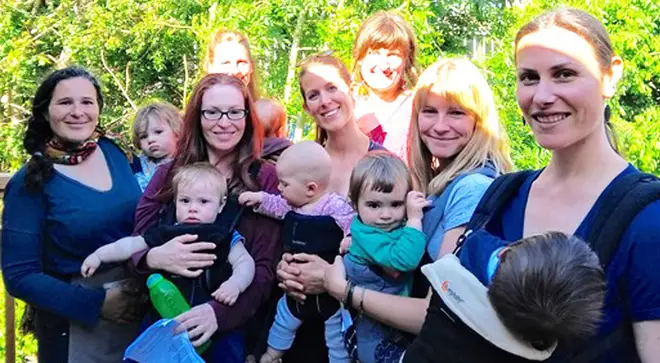 Mums and their babies singing in the garden