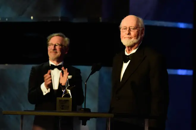 John Williams receives the American Film Institute’s Life Achievement Award, as Steven Spielberg applauds.
