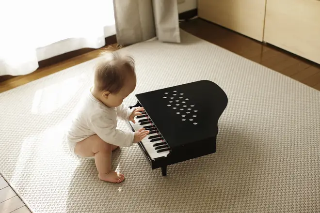 Baby boy plays piano