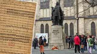 Crowds gather at Bach’s statue ahead of a performance of his St John Passion