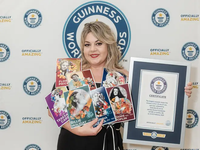 Gabrielle Di Laccio accepts the Guinness World Record for the Longest Acoustic Music Live-Streamed Concert.