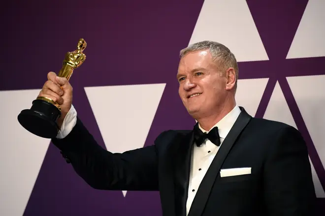 John Ottman showing off his Academy Award for ‘Bohemian Rhapsody’ at the 2019 Oscars
