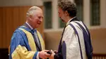 King Charles presents opera star Jonas Kaufmann with an honorary Doctor of Music award at the Royal College of Music