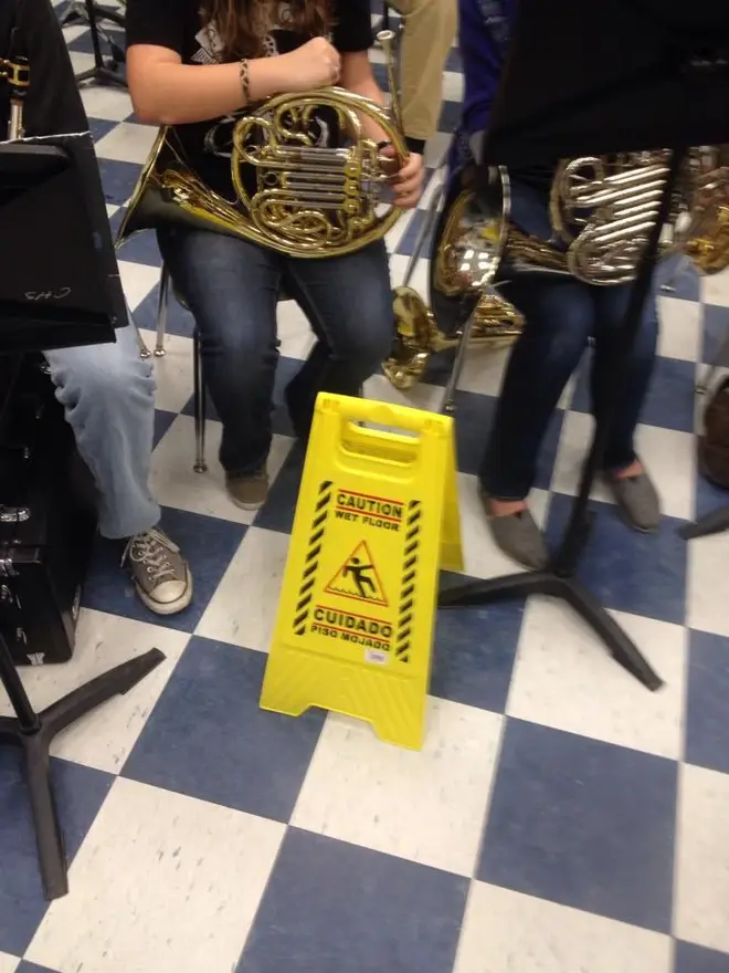 Wet floor by French horns