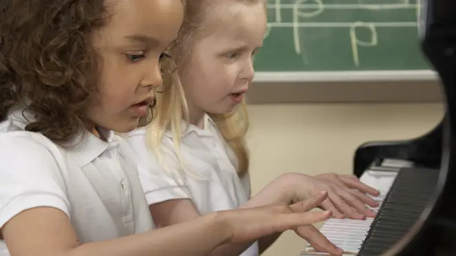 Primary school children in a music lesson