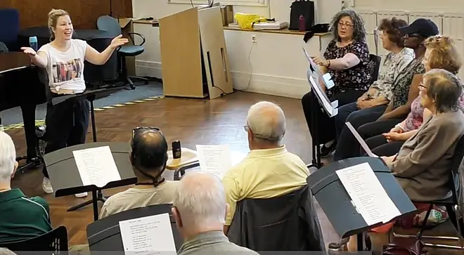Choir members attend a weekly rehearsal in London