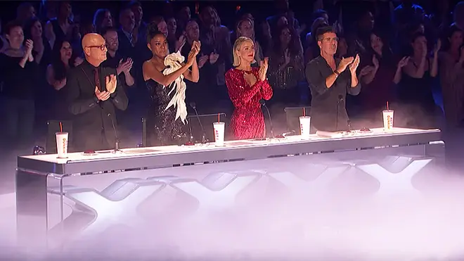 AGT judges give Emmane Beasha a standing ovation following her spectacular performance