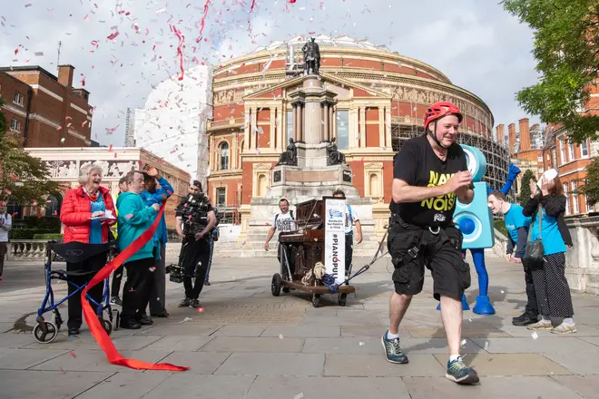 Tim pulls a piano across London for Global's Make Some Noise