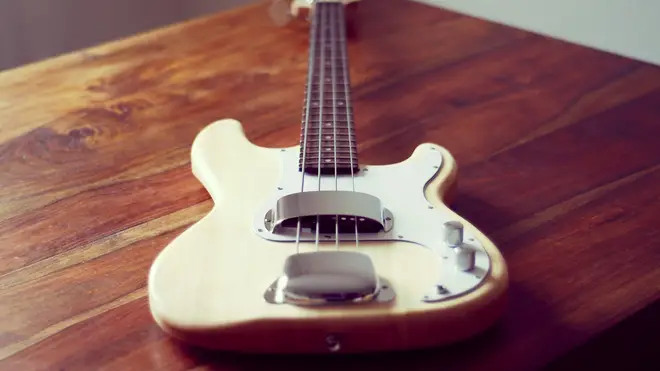 Wooden Fender bass guitar