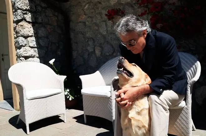 Andrea Bocelli and his dog